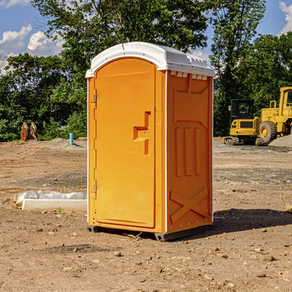 how often are the porta potties cleaned and serviced during a rental period in Sweeny